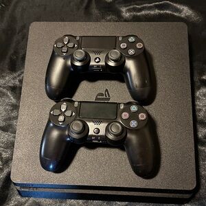 Sony PlayStation 4 Console with DualShock Controllers - Black
